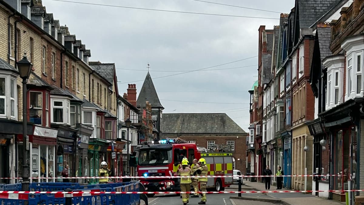 Fire service called after smoke and sparks come from under Powys road
